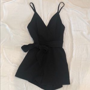 Black dressy romper with bow